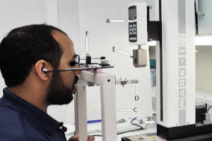 Denture retention with adhesive image